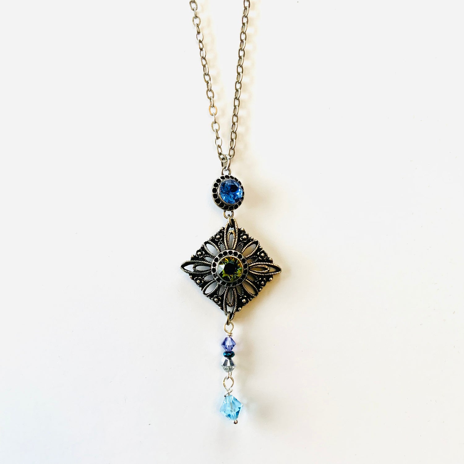 Long Sunburst Filigree Necklace in Aqua Meridian Blue
