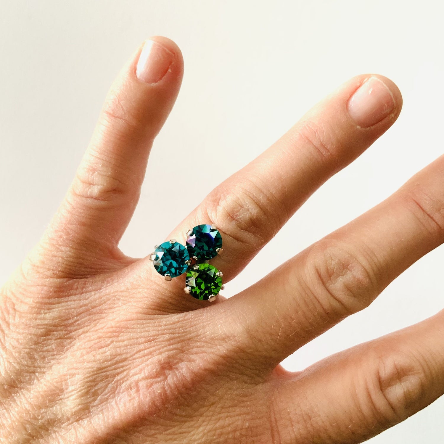 Triple Cluster Ring featuring Emerald Glacier Blue