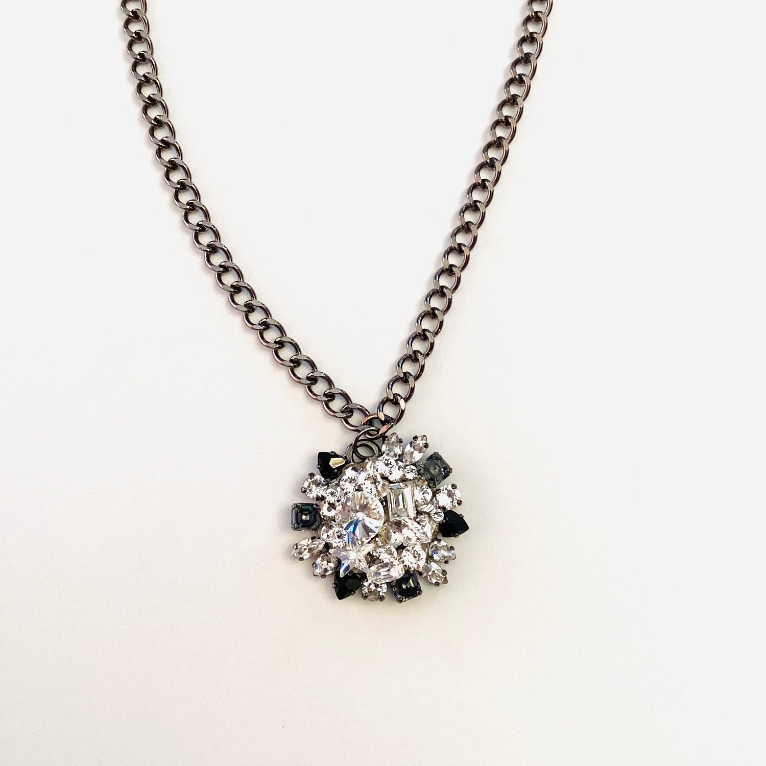 Medallion Treasure Chest Round Pendant Necklace in Black/Silver Hues