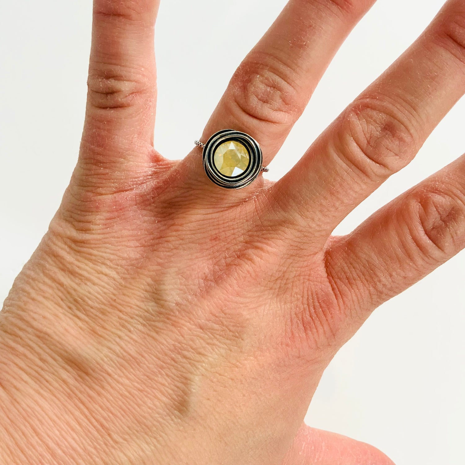 Swirl Solitaire Ring featuring White Opal Golden Shadow